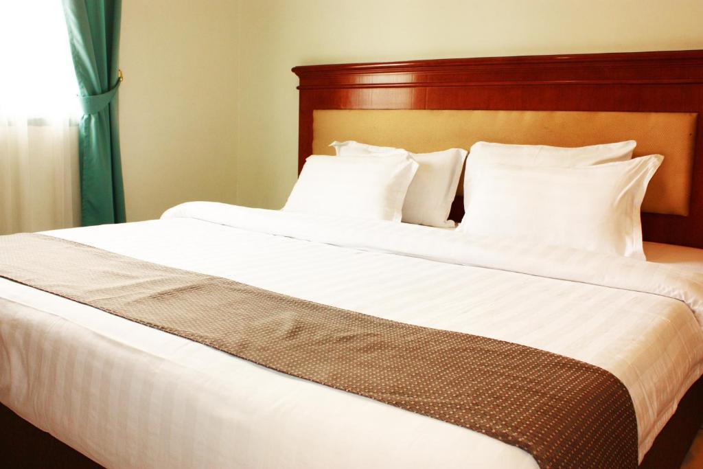 Travellers Suites Serviced Apartments Медан Номер фото